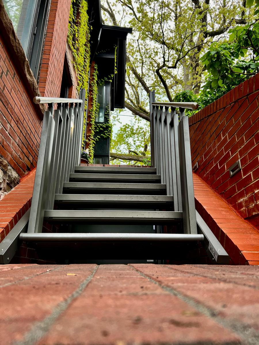 VPL on heritage brick exterior — stairway view